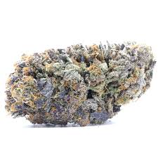 Close-up of Blue Dream cannabis buds featuring vibrant green colours, orange hairs, and sparkling trichomes with sweet berry aromas.